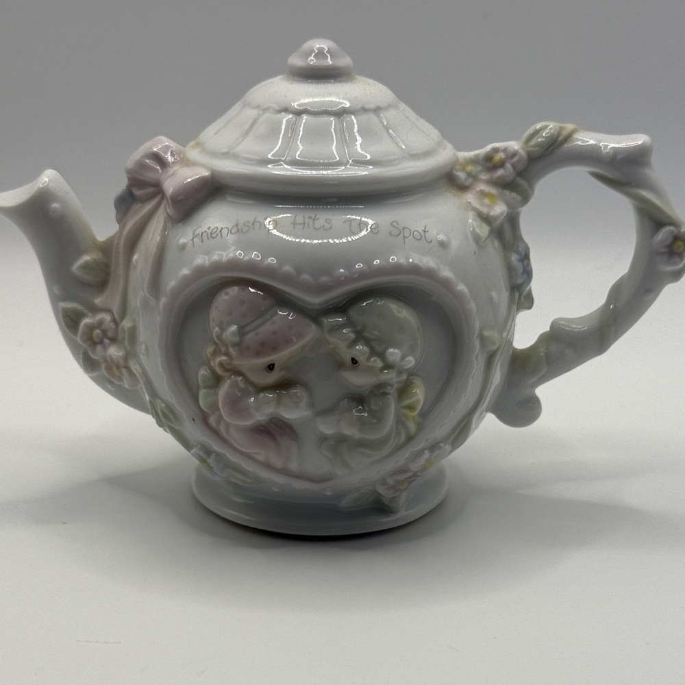 Charming Ceramic Teapot with Pastel Accents